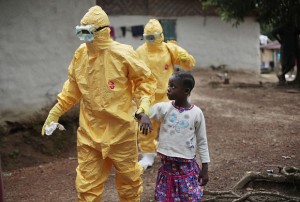 Medical staff treating an Ebola victim