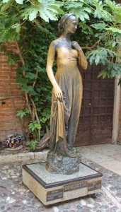 The statue of Juliet in the courtyard in Verona
