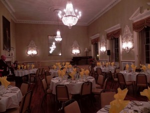 The upper room of the Town Hall set up for a dinner