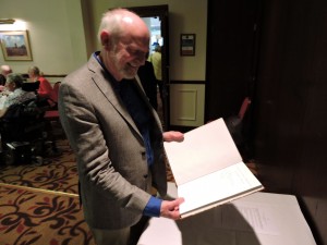 Stephen Sharp with his book